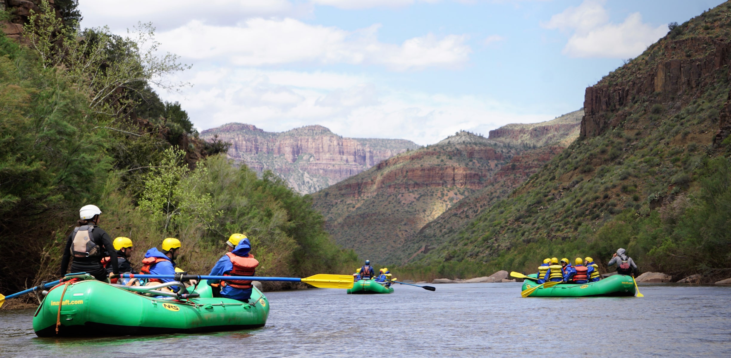 A group of white water rafters float a mellow stretch of Arizona's salt river