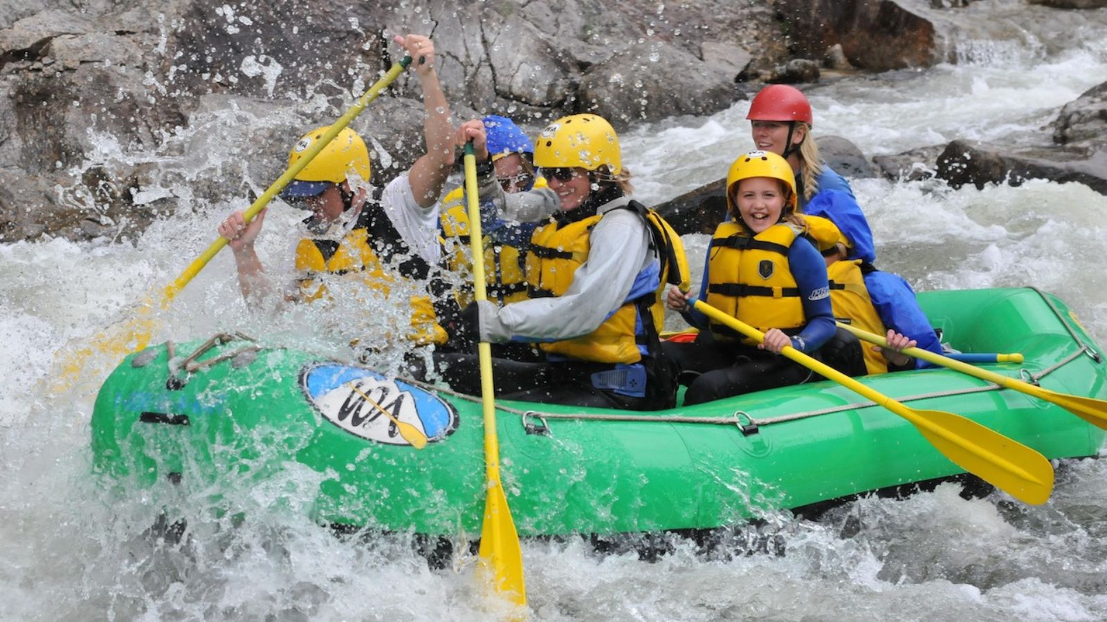 A family enjoys a raft rip while in Buena vista, Colorado