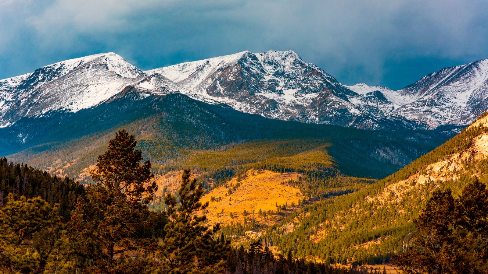 Rocky Mountain National Park Loop with snow covered mountains during a road trip from Denver